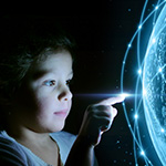 kid touching a ball of light